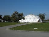 This geodesic dome was originally built in Detroit, Michigan, in 1978. It had been used as a car showroom but became available for sale in 2000. Seizing the opportunity, Vitra purchased the dome and shipped it to Weil-am-Rhein, a simple task since Fuller designed his domes to be temporary structures and thus easily constructed and deconstructed.