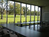 Though the conference rooms look onto the busy road outside the building, inside it is perfectly quiet and they are contemplative spaces.