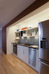 Here's a view of the kitchen—tiny, but it's equipped with all the convinces of a larger space. The appliances are by Bosch.

Photo courtesy of the DOE.