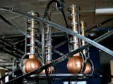 Here's Mack's mild steel X-Ray chandelier, a steampunk-ish light fixture that has something of a mad scientist vibe. It looked great at night, all lit up.
