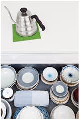 Organization is critical in keeping the Tatami House’s minimalist vibe intact. Shoko keeps the kitchen drawers tidy.  Search “glass-teapot-with-infuser.html” from Looking Inward