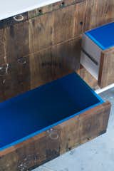 The wood used for the front of this dresser was taken from a 1950s factory cart. I really like the pop of cerulean in the drawers.