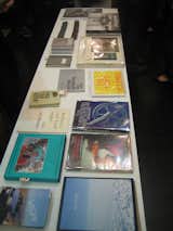 The center aisle of the shop was taken up by two tables filled with books and printed matter. The best of this lot was a small book of the architectural photos of Takashi Homma.