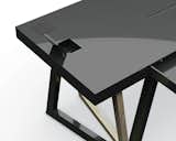 Unlike your typical sawhorse desk, which often comprises a pair of struts and a board as the desktop, the QuaDror system can support a much sleeker aesthetic.  Search “quadror action” from Top Dror