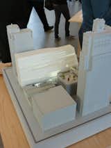 You can see how the new building, with its rippling facade, faces into the city block.