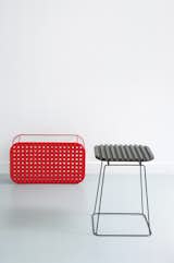 Created for ENO (Editor of New Objects) in 2008 and available in three sizes, the Ajours table features a latticed lacquered-wood seat affixed to a steel base.