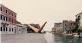 This is the sculpture Wings on the Fondamenta della Tana at the Venice Biennale, 5th International Architecture Exhibition in 1991.  Search “decorex international” from Massimo Scolari's Drawings at Yale