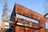 The house is clad in weathering steel panels and has a strong sense of horizontality. Photo by Brian Mihealsick.  Search “outdoorfences--horizontal” from Lakeside House in Texas