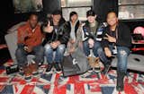 Musicians Tommy Lee (second from left) and Deadmau5 (second from right) repose on a Soho sofa from Poliform in the Vevo Powerstation end of the lounge.