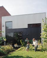 Exterior, Metal Siding Material, and House Building Type It’s simple to make lasting changes to your home, wardrobe, and everyday life that are kind to the planet.  Photo 1 of 19 in Practicing Sustainability Is Easier Than You Think With These Handy Guides from Split the Difference