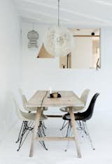 Here's the weathered wooden dining table where the family gathers for meals and conversation.
