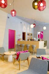 As you can see from the bright accents of powder blue and Barbie pink, the interior is meant to elicit a strong response. According to Note, owner Michael Toutoungi said that he wanted a space that "people either love or hate and that nobody is indifferent to." The aesthetic is definitely stronger and more playful than most cafe's I've visited.