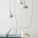 Thought these lamps by Miriam Aust and Sebastian Amelung appear to be featherweight paper, they're actually concrete!