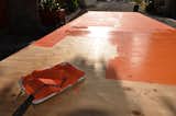 Painting the base coat bright orange.  Photo 3 of 7 in The Making of Screenplay: Part 5