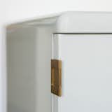 Brass Tactics

The best way to showcase vintage hardware is to polish it lightly and paint door and window frames a pale white or gray, according to Hayon. Brass hardware also effectively accents mint-colored furniture like the Bisazza Bagno cabinet in the living room, a Hayon design from 2011.