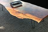 The walnut coffee table in the living room is by Samuel Moyer.