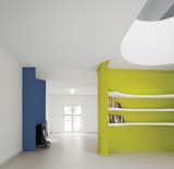 For a recently completed project in Almada, Portugal, Gadanho carved out a fluorescent green volume from a full wall running through the space. It now divides the residence without blocking light; from the entry, visitors can see all the way from the dining room to the garden.  Search “green design” from In Living Color