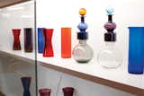 a display of vintage glass pieces, by Kaj Franck.