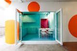 What was once a childcare house for Bangkok University is now an creative office space swathed in electric colors.