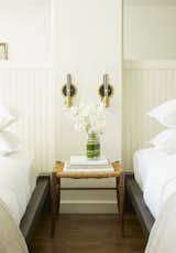 Vermont manufacturer Conant Lighting produced the wall sconces, which are ASH's desing, next to each bed.