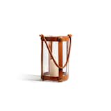 Quickly recalling the warm, organic, functional design of Scandinavian modernism, the Marstrand Candle Lantern ($180) by Skargaarden can be used indoors and outdoors. Its leather strap can be comfortably held or easily hung on the wall.