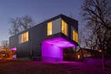 On a wooded plot in Arkansas, the architecture firm Silo AR+D erected a radiant live-work home that announces its nocturnal presence by projecting colored light from concealed LED fixtures. The home's tone can be manipulated and controlled via smartphone.  Search “Pet-Raincoat-With-D-Ring.html” from This Illuminated Arkansas Home Changes Colors with the Tap of a Smartphone