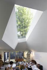 The abstract geometry of this space led to the creation of unusually shaped skylights that were designed to bring in consistent, soft northern light.