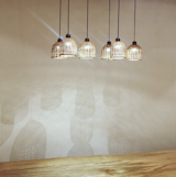 These woven pendants from OMO Furniture are made of rattan.