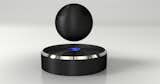 Opposing magnets keep the 3/4-pound black sphere floating above the base, and the speaker unit housed inside is rechargeable—pull it from the floating base and plug it in, and a full charge gets 15 hours of playback.  Photo 2 of 3 in Wireless Speaker That Levitates by Alexander George