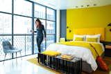 Neutral accents offset bright yellow details in this room.  Photo 1 of 25 in 25 Playful Homes Splashed With Vibrant Pops of Yellow from The William