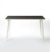 BA table (1955)

This streamlined table features cast aluminum legs and a laminated plywood table top.
