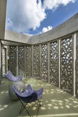 Another view of the outdoor sitting areas.  Photo 4 of 7 in Concrete Hotel in Puerto Rico Plays with Light and Shadow by Allie Weiss
