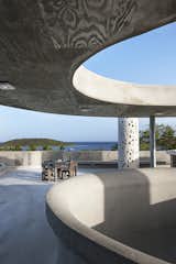 Outdoor and Concrete Patio, Porch, Deck A sweeping terrace area is home to the hotel's restaurant, run by Chef Jose Enrique.  Photo 7 of 7 in Concrete Hotel in Puerto Rico Plays with Light and Shadow by Allie Weiss