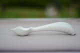 Creator Michael Chou took the ergonomically flawed design of the typical ice cream scoop, and angled it and added a grip so that it takes less effort to use. Chou, a 35-year-old father and aerospace engineer from Michigan, went through 38 iterations over two years of development before settling on the design.