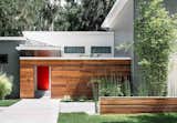 An enclosed courtyard, bordred by ipe, is arguably the most distinctive feature of the house that the Phil Kean Design Group created for Adriana De Azevedo, Daniel Coelho, and their two daughters in Winter Park, Florida.