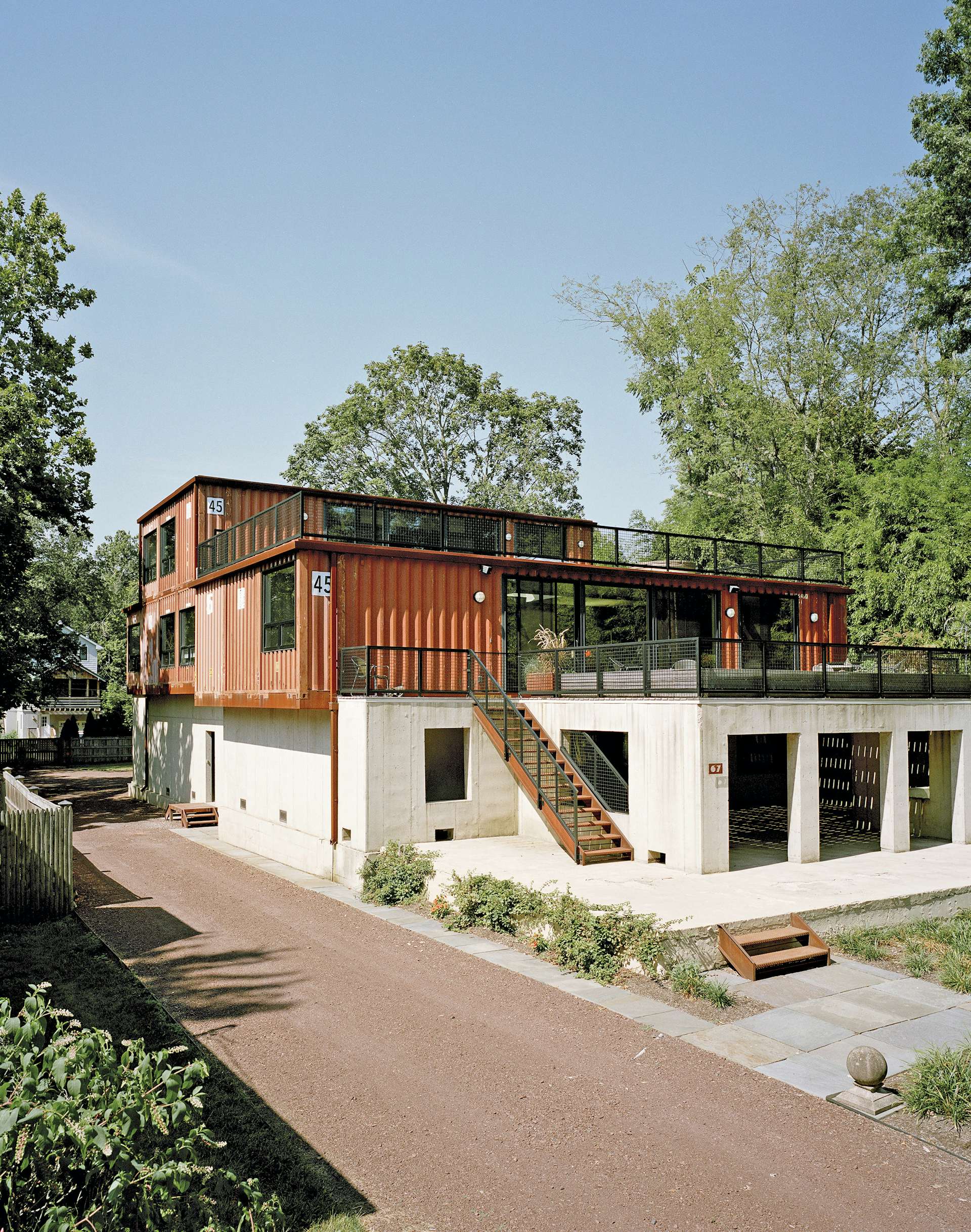 Just off the Delaware River in Pennsylvania, Martha Moseley and Bill Mathesius adapted an unused concrete foundation to create a home made from 11 stacked shipping containers. 