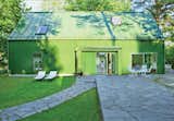 This Bright Green Prefab in Sweden Looks Just Like a Monopoly House