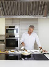 Kitchen, Wall Oven, and Cooktops Eric Ripert invited Dwell into his personal kitchen he co-designed with Poggenpohl and made us the perfect cod basquaise.  Photo 1 of 1 in Recipe: Eric Ripert’s Cod Basquaise