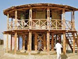 In the aftermath of a 2005 earthquake in the Hazara and Kashmir regions of Pakistan, Lari came up with a bamboo shelter system called KaravanRoof that is designed with low costs and a low-carbon footprint. The structures are typically built with adobe-and-mud walls and strong bamboo cross bracing—all of which are raw materials available locally and suited to both rural and urban areas.  Photo 1 of 2 in Yasmeen Lari