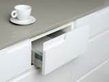 Dunsmuir's line of kitchen cabinets are meant to give Ikea kitchens the look and feel of more costly European brands at a fraction of the cost. Here's a shot of their integrated drawer pull.