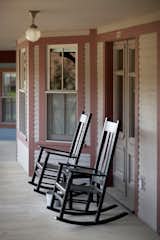 Lined with antique rocking chairs, the space has a laid-back summer camp quality that seems to extend through the seasons.