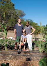 Gabbert and Avery pose with Ingrid in their “growing ground,” planted and tended by local urban farmer Tara Kolla and a fleet of volunteers.