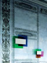 Color on Color Mirror, for Glas Italia, 2010

In this three-part collection, Grawunder layers color “like a painter would do,” including Rothko-esque “black-out parts, which is what the mirror does.” The mirror, at center, is the only part of the fixture that’s not colored. “They wouldn’t let me put light in this,” Grawunder says, which, ultimately was a good idea. “The color of the glass itself is so luminous, it almost looks backlit.”