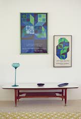 Paton has specialized in pottery and objets throughout her collecting career, though this pair of posters by Victor Vasarely carries this vignette in the bedroom.