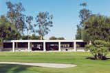 A long low response to the rugged landscape, Doug and Stacey’s house is a linear white exercise in modern entertaining.  Photo 9 of 15 in A Storied 1980 Party House in the Southern California Desert Enters a Mellower Chapter of Soirées