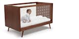 The Nifty Clear Collection which combines the clean lines of the mid-century aesthetic with  Ubabub’s innovative clear acrylic sides, providing visibility for parents, easy assembly and converts to a junior bed.
