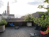 Another highlight of the hotel is the roof deck, outfitted with canvas butterfly chairs and offering spectacular views of the Cathedral and surrounding neighborhood.  Photo 12 of 15 in Best of Belgium: Three Days in Antwerp by Jaime Gillin
