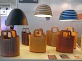 This ultra-thin wood by Japanese brand Woodum is woven into fabric to create upholstery, pillows, placemats, and bags.  The lampshades are made by fellow Japanese brand Cuiora from tightly rolled lengths of recycled paper.  Search “killspencer-bags.html” from Into the Woods at Maison & Objet 2012