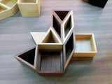 Triangular–, square–, and diamond-shaped wooden boxes have magnets embedded into the sides so that they can join together to create endless geometric patterns that function as a super beautiful desktop organizer. Made by Japanese brand Colors, the MagContainers are available in Walnut, Japanese quince, and Tamo wood.  Search “illuminated arkansas home changes colors tap smartphone” from Into the Woods at Maison & Objet 2012