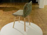 This chair was part of an exhibition by The American Hardwood Export Council, British furniture brand Benchmark and the Royal College of Art. RCA students were asked to design a chair using the American Hardwood that explores the entire lifecycle of the product. Marjan van Aubel and James Shaw found a way of incorporating waste shavings into their design by mixing them with bio-resin. When combined together with colored dye, the shavings and the resin formed a strong but lightweight foam which they molded into a chair.